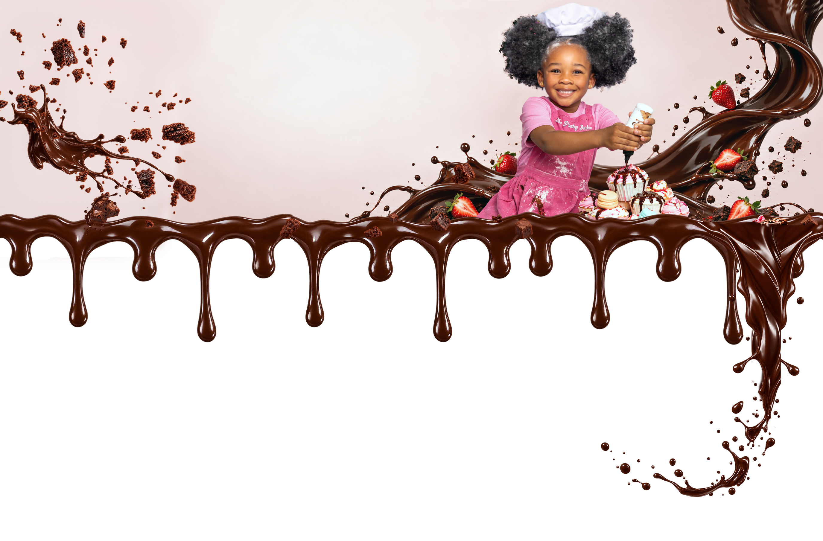 Our young baker pouring chocolate over cupcakes, surrounded by chocolate ribbons and strawberries.